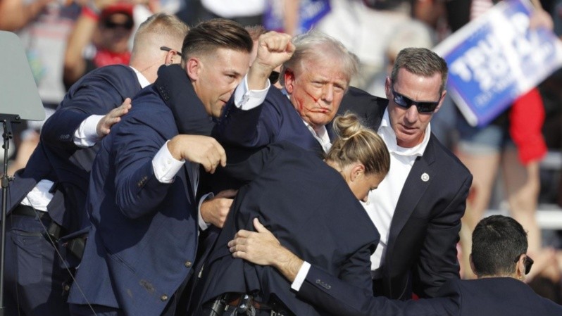 Former US President Donald Trump rushed off stage after incident at campaign rally